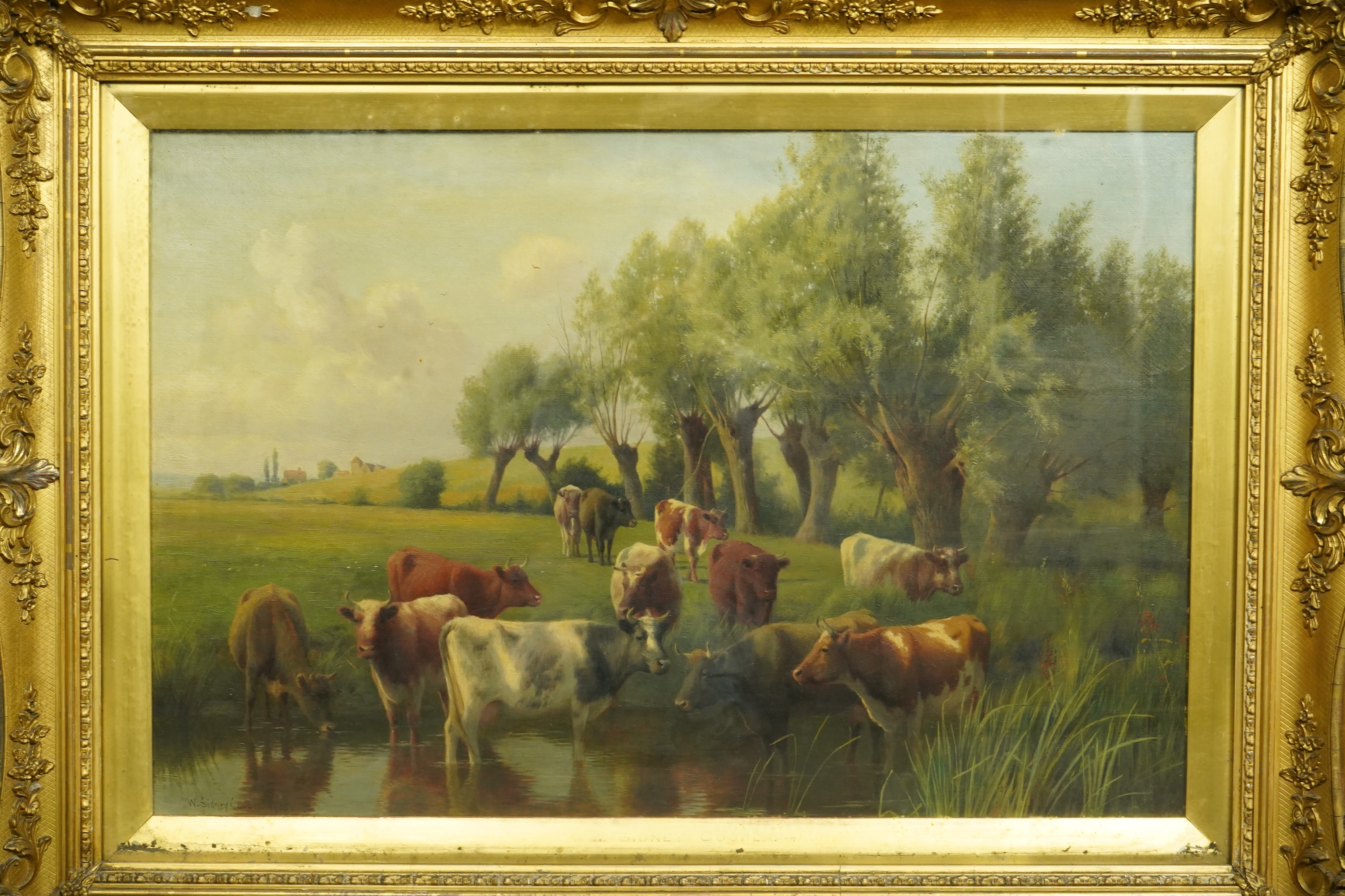 William Sidney Cooper (English, 1854-1927), Cattle watering, willow trees beyond, oil on canvas, 49 x 75cm